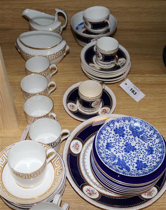 Worcester coffee cans and saucers and Worcester floral teacups and saucers